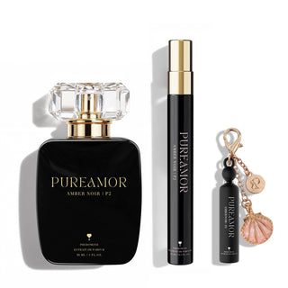 PUREAMOR perfume bottle, travel spray, and keychain on a white background