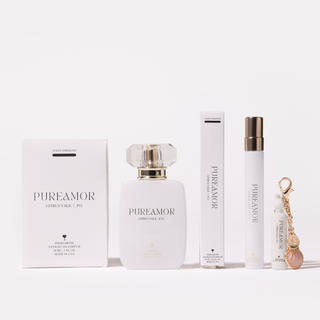 PUREAMOR perfume set with perfume bottle, travel spray, and keychain on a white background