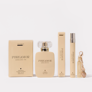 PUREAMOR perfume set with perfume bottle, travel spray, and keychain and packaging on a white background