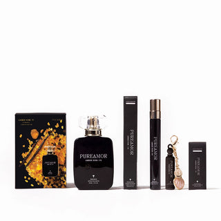 Collection of Pureamor perfume products including a bottle, travel spray, and keychain on a white background