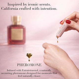 PureAmor pheromone 2ml keychain mist applied on hand, offering a captivating fragrance for naturally intimate moments, thoughtfully crafted in California
