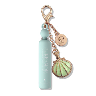 Mint green 2ml keychain with shell charm on a white background