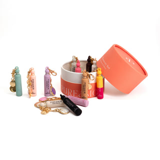 Pureamor Discovery Set featuring multiple Pureamor 2ml keychain perfumes.