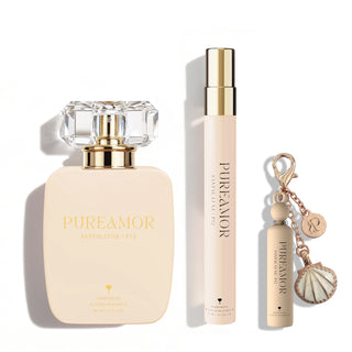 PureAmor Santal Luxe pheromone set with perfume bottle, travel spray, and keychain, showcasing a smooth, woody fragrance on white background.