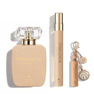 Set of PureAmor perfume bottle, travel spray, and keychain on a white background