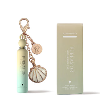 Perfume bottle 2ml keychain with shell charm and packaging on a white background