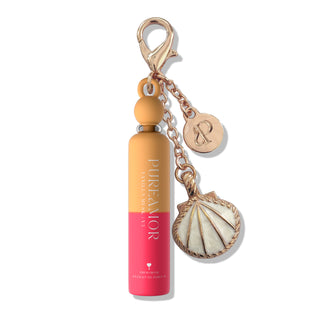2ml Keychain with a bottle-shaped charm and shell pendant on a white background