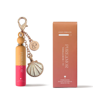 Perfume 2ml keychain with shell charm and packaging on a white background