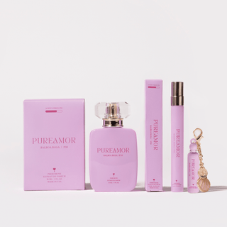 PureAmor Balboa Rosa pheromone perfume kit with perfume bottle, travel spray, and keychain displayed as a complete floral fragrance collection.