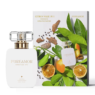 PUREAMOR citrus vale 30ml perfume bottle and packaging with green leaves and oranges on a white background