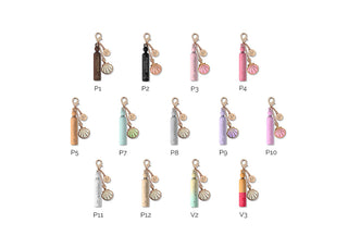 All thirteen 2ml keychain perfume scents labeled by code on a white background.